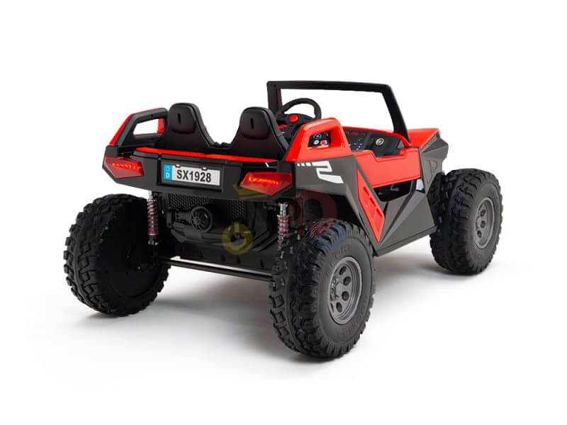 Meet the Red 24V/4X4 Dune Buggy Ride On UTV, featuring a rugged red and black design. It comes with large rubber wheels, two seats, a steering wheel, and a small SX1928 license plate for authenticity in any off-road adventure.