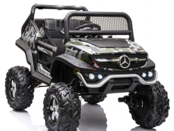 Introducing the Camo 12V/4X4 Official Mercedes Unimog Junior Ride On UTV, a toy car styled with camouflage patterns, large rugged wheels, a grille reminiscent of a Mercedes-Benz, and visible seats—all set against a pristine white backdrop.