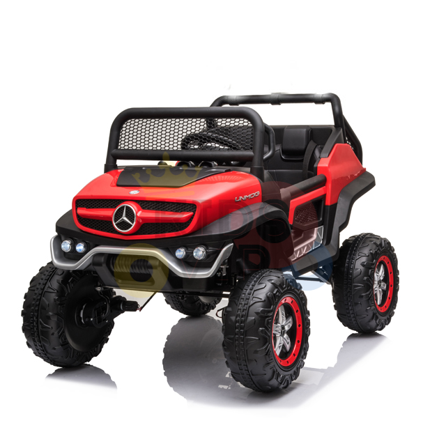 The Red 12V/4X4 Official Mercedes Unimog Junior Ride On UTV features large rugged wheels, front headlights, a protective grille, and an interior steering wheel, making it perfect for off-road adventures with kids ready to drive. Also includes remote control for added safety.