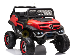 The Red 12V/4X4 Official Mercedes Unimog Junior Ride On UTV features large wheels and a net-like windshield cover for adventurous play. Styled in red and black, it includes a small seat and steering wheel. An optional remote control allows for enhanced parental supervision.