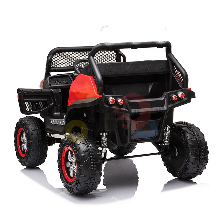 The Red 12V/4X4 Official Mercedes Unimog Junior Ride On UTV, a kids off-road toy with large wheels, a steering wheel, and rear cargo area, is featured from the back angle on a reflective white surface.