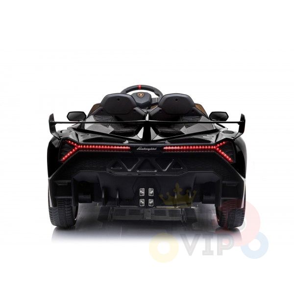 The Black 2X12V Limited Edition 4WD Lamborghini Veneno Ride on Car, RC features a rear view with a sleek, angular design and detailed red taillights. This dual-seat ride-on resembles a high-performance vehicle with a spoiler and visible brand logo, enhancing its authentic look.