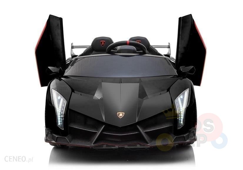 The Black 2X12V Limited Edition 4WD Lamborghini Veneno Ride on Car is a sleek, angular 2-seater with upward-opening doors and narrow headlights for a futuristic look. Reminiscent of the iconic design, it includes a parental remote control to ensure safety.