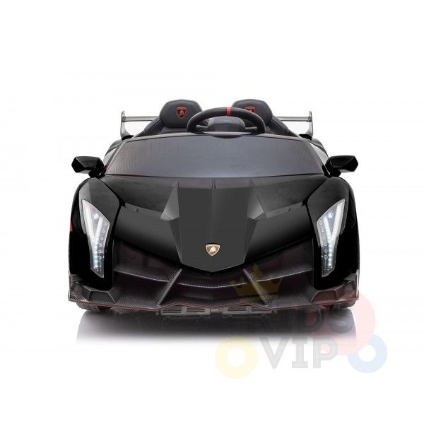 The Black 2X12V Limited Edition 4WD Lamborghini Veneno Ride-on Car showcases a sleek front view with angular headlights, a sculpted hood, two small seats, and the iconic logo on its grille. Designed for children, it includes a parental remote control for enhanced safety.