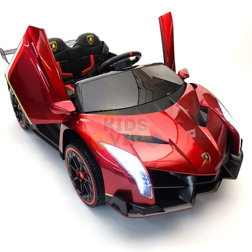Introducing the Red 2X12V Limited Edition 4WD Lamborghini Veneno Ride on Car, RC: a sporty marvel featuring upward-opening doors, detailed lights, black seats, and a visible steering wheel. Enjoy added safety with a parental remote control for peace of mind.