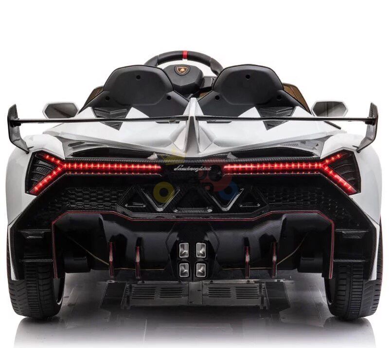 Rear view of the White 2X12V Limited Edition 4WD Lamborghini Veneno Ride on Car, RC, mimics an iconic sports car with its aerodynamic 2-seater design, sharp tail lights, prominent rear diffuser, dual exhaust pipes, and large rear wing reflecting high-performance styling.