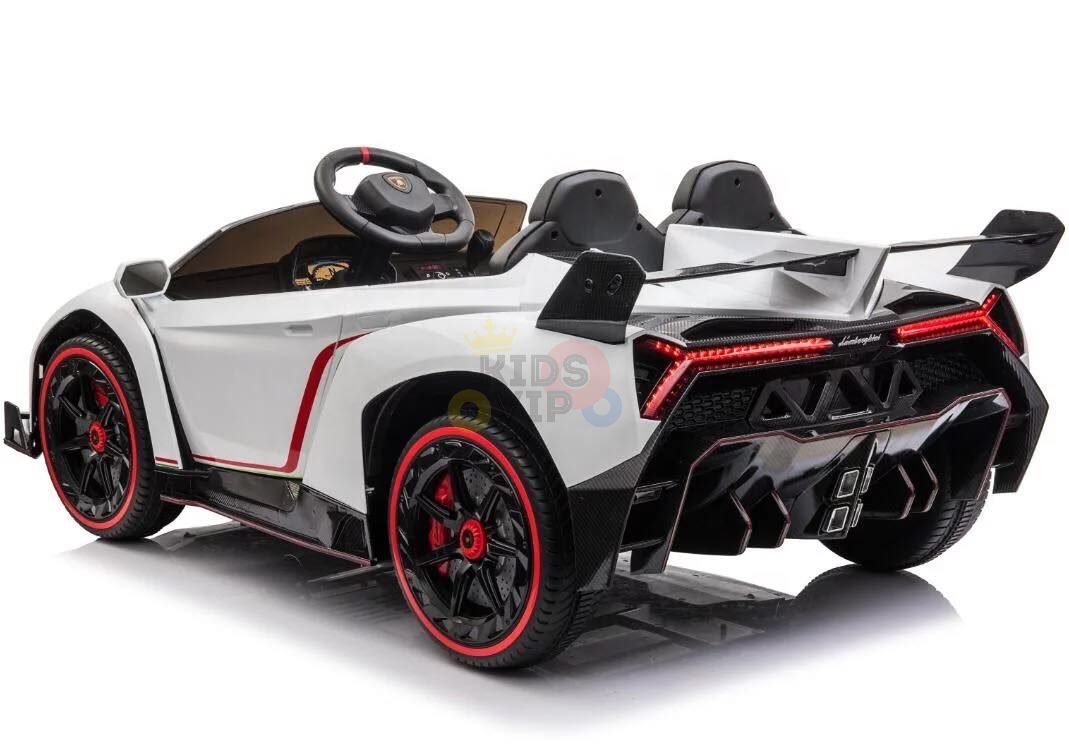 The White 2X12V Limited Edition 4WD Lamborghini Veneno Ride-On Car boasts red accents, stylish wheels, and an aerodynamic spoiler. This two-seater with a detailed design is perfect for children dreaming of speed and style.