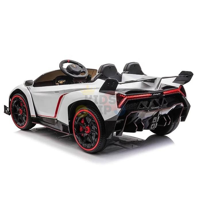 The White 2X12V Limited Edition 4WD Lamborghini Veneno Ride-on Car features two seats, a steering wheel, bold rear design, detailed wheels with red rims, and a prominent rear spoiler, mimicking luxury models.