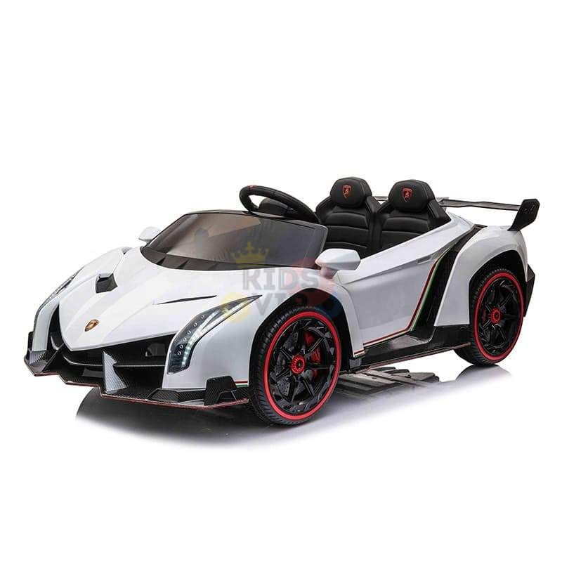The White 2X12V Limited Edition 4WD Lamborghini Veneno Ride on Car features a sleek design with black and red accents, two seats, a racing steering wheel, and detailed headlights for an ultimate miniature driving experience.