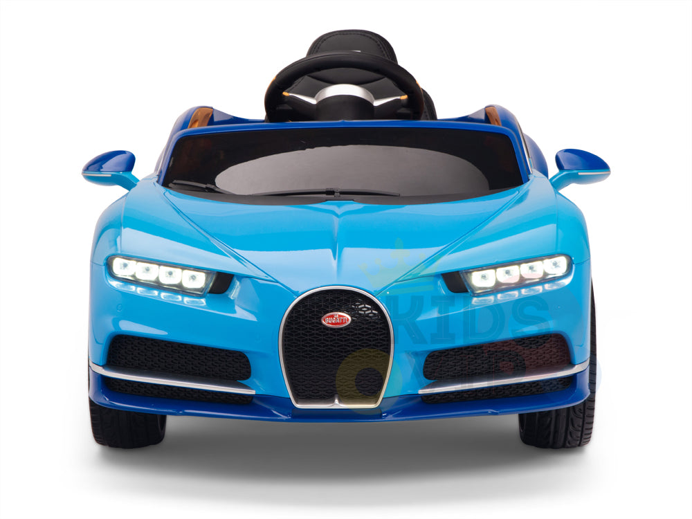The Blue 12V Bugatti Chiron Kids Licensed 1 Seater Ride On Car features a sleek body, LED headlights, detailed grille, and aerodynamic shape. With a realistic steering wheel, remote control functionality, and rubber wheels, it promises an exhilarating experience.