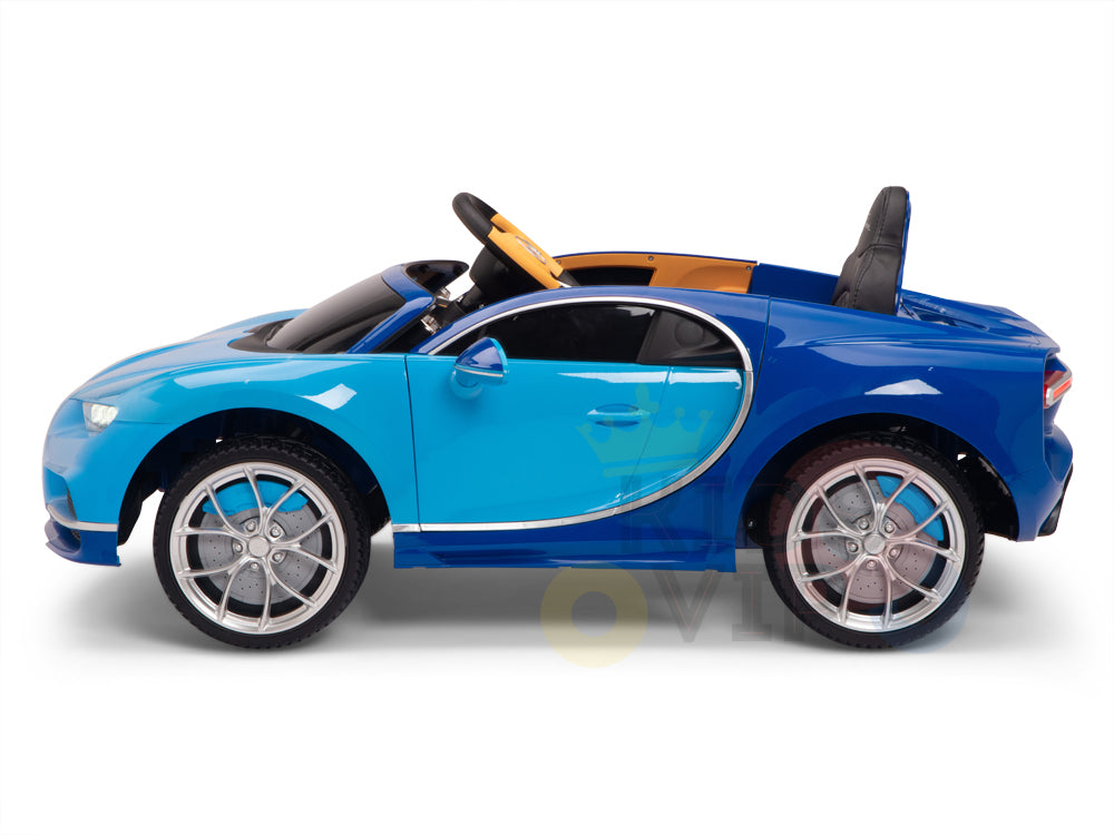Displayed on a white background, the Blue 12V Bugatti Chiron Kids Licensed 1 Seater Ride On Car features sleek design, black seats and steering wheel, rubber wheels, and offers fantasy fun with its remote control for effortless navigation.