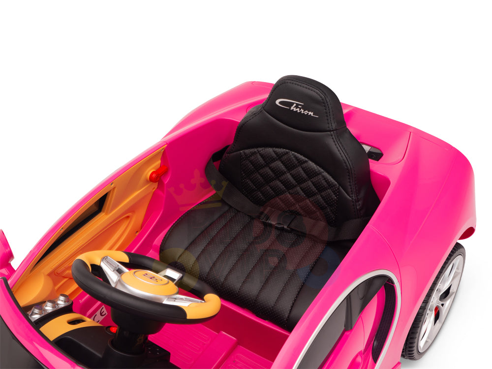 The Pink 12V Bugatti Chiron Kids Licensed 1-Seater Ride-On Car features rubber wheels, a black quilted seat with Chiron on the headrest, and a dashboard with a steering wheel and logo, promising an exciting adventure.