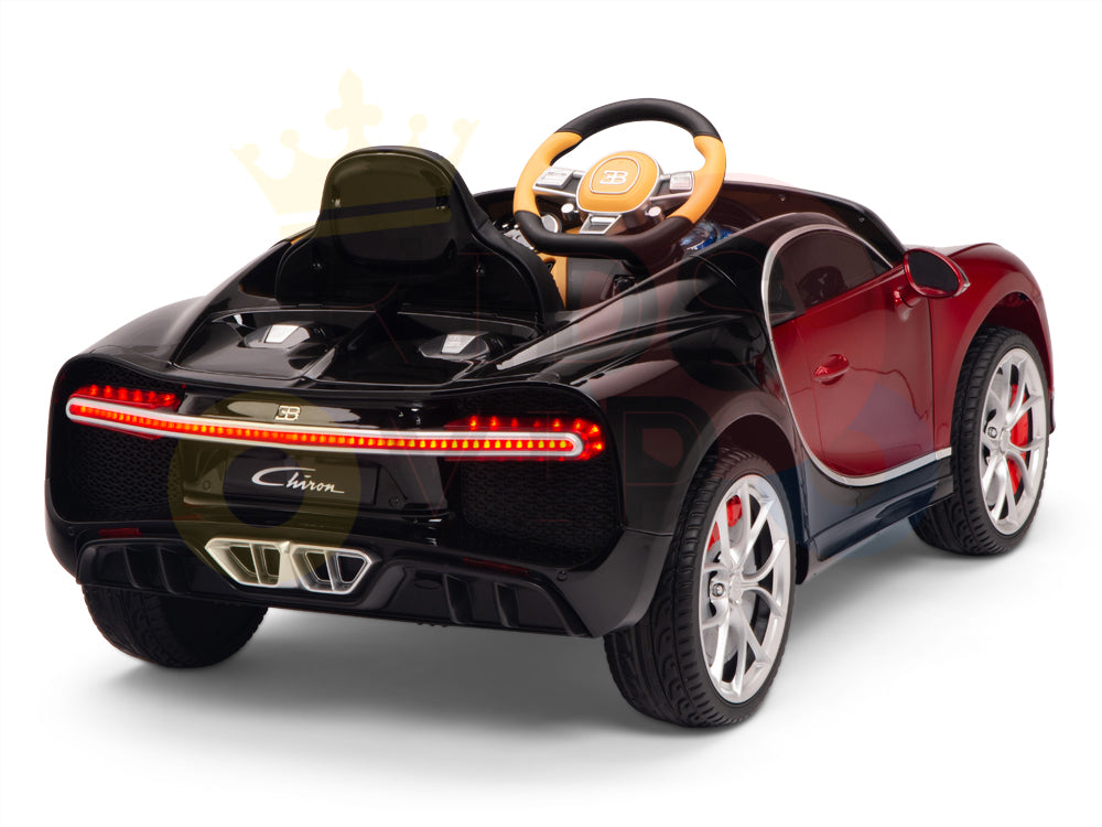 The Red 12V Bugatti Chiron Kids Licensed 1 Seater Ride On Car features detailed headlights, rear lights, and a steering wheel. It boasts silver rims with red accents and Eva rubber wheels, emphasizing its back and side view.