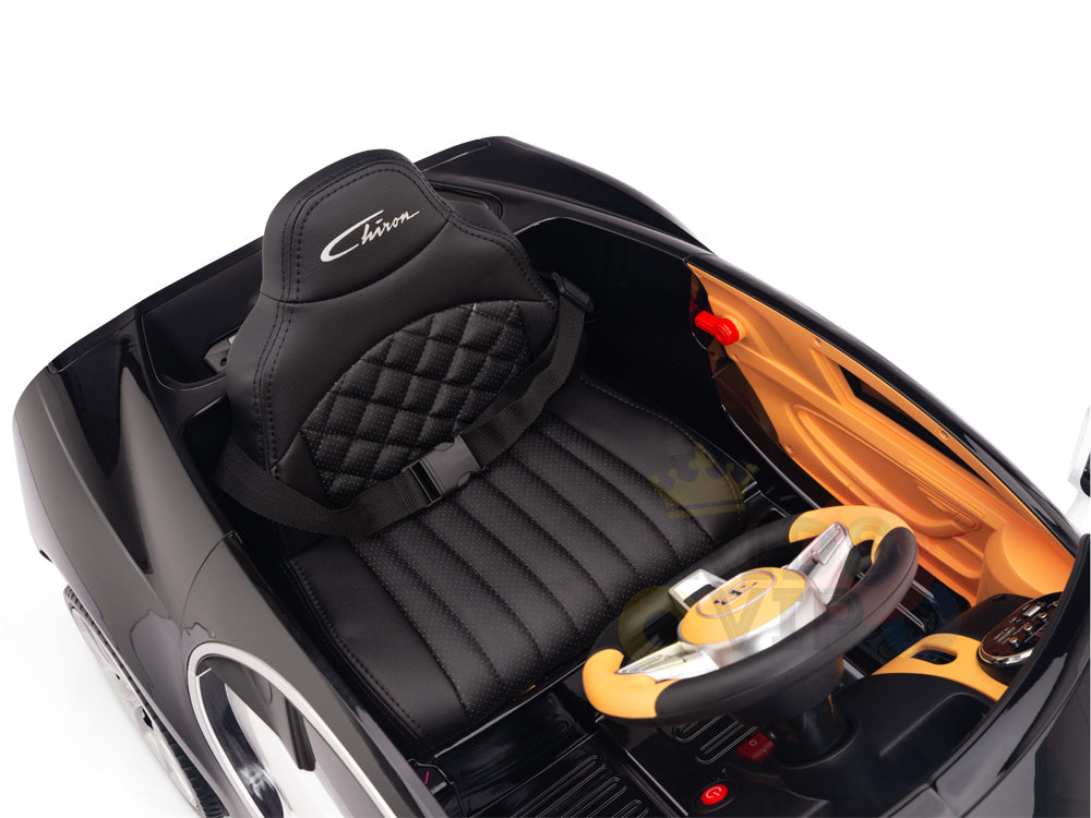 A white Bugatti Chiron Kids 12V Ride On Car featuring a quilted seat with Chiron branding, a tan dashboard, a detailed steering wheel, and rubber wheels for smooth rides. Remote controlled and licensed as a single-seater.