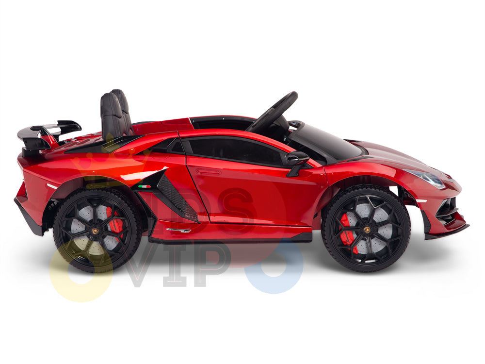 The Burgundy Red 12V Lamborghini SVJ Sport Kids Licensed Ride On Car flaunts a sleek design with one open seat and rubber wheels. This ride-on, showcased in profile, offers an authentic sports car experience with a remote control for added fun.