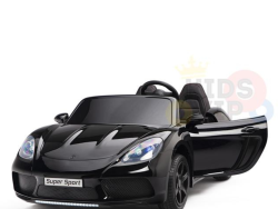 The Black 24V XXL SuperSport Big Kids Ride On Car features sleek aerodynamic lines, detailed headlights, and ECO leather seats visible through the open drivers door. This stylish KIDSVIP Supercar with a 180W brushless motor and real tires stands against a plain white background for young enthusiasts.