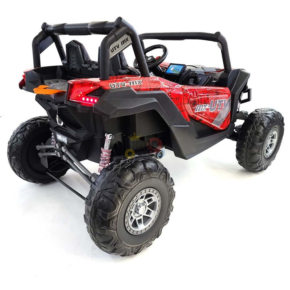 The Spyder Red XXL 2 Seats Challenger 24V MX Buggy MP4 Edition 4x4 Kids Ride On Car with UTV branding, rubber wheels, roll cage, and visible suspension features glowing rear LED lights while parked on a white surface.