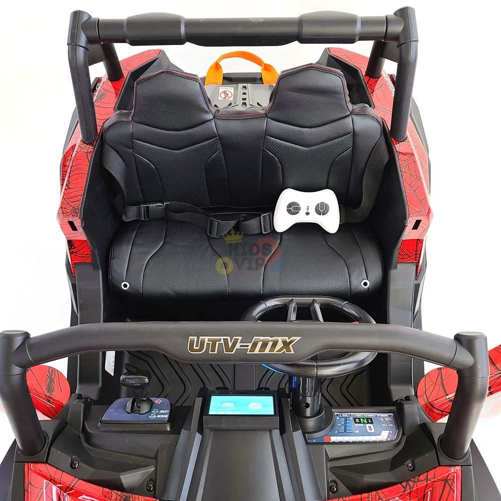 The Spyder Red XXL Challenger 24V MX Buggy is a thrilling 4x4 UTV for kids, featuring a black and red interior with steering wheel, control panel, and white game controller. Its rugged design includes visible roll bars, making it perfect for adventurous young drivers who love off-road excitement.