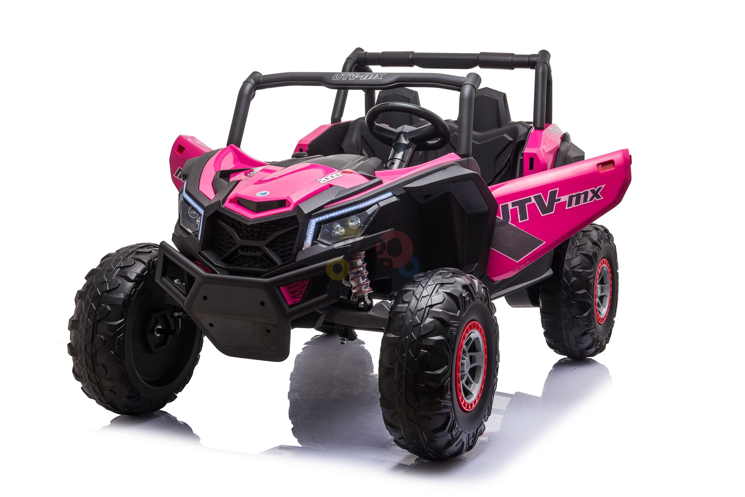 The Pink XXL Challenger MX Buggy Kids Ride On Car, inspired by the UTV 24V edition with large rubber wheels and detailed headlights, sits angled on a white background showcasing its sturdy bumper and UTV branding.