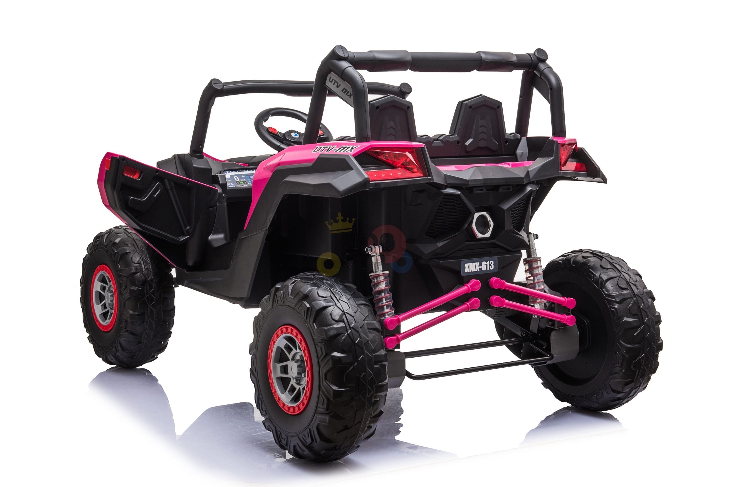 The Pink XXL 2 Seats Challenger MX Buggy 24V Edition Kids Ride On Car/UTV features large rubber wheels with pink accents, a steering wheel, and two seats and is seen from the back-left angle on a glossy surface.