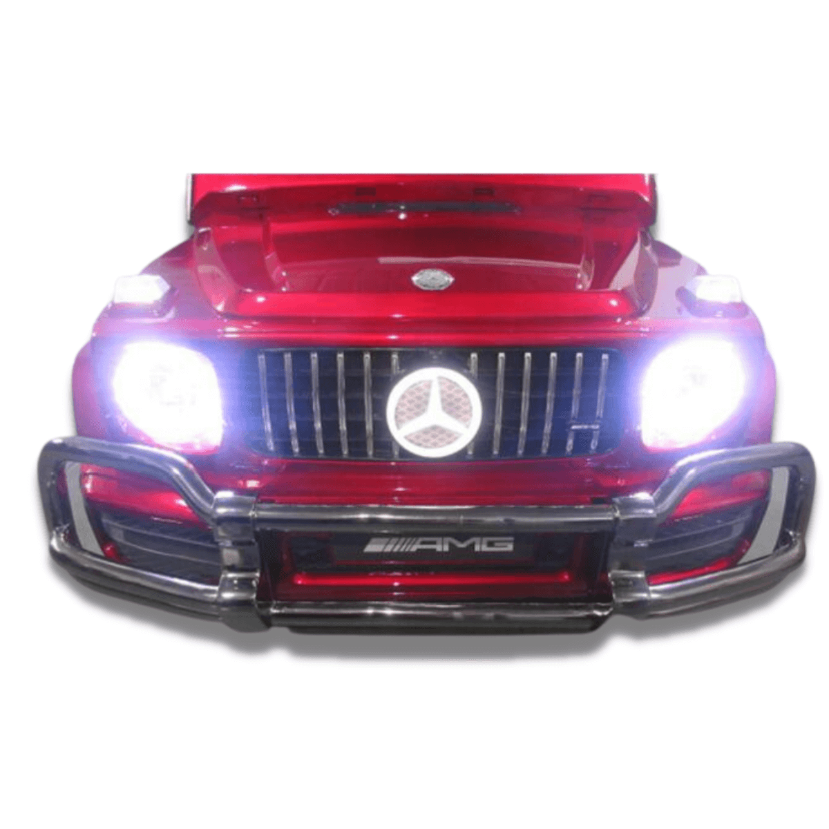 Close-up of a toy car resembling a red Mercedes-Benz with headlights, grille, bumper, and AMG branding. The Special LED Edition 24V G Series Kids Ride-On offers thrilling adventures and includes a parental remote control for added safety.
