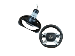 The 12V-Maybach-Small Steering Wheel, featuring the Mercedes-Benz logo and a steering column component, is showcased on a white background. Ideal for your ride-on car project. Contact us for more details or inquiries.
