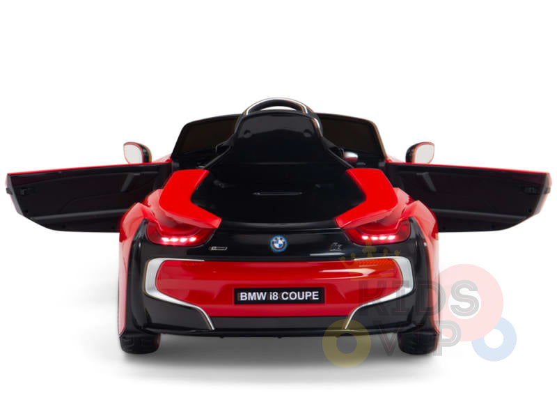The Red Licensed Sport BMW I8 12V Kids Ride On Power Car features an electric design with black accents, upward-opening doors, visible rear lights, and a BMW i8 COUPE license plate against a white background. Includes parental remote control for adventure.