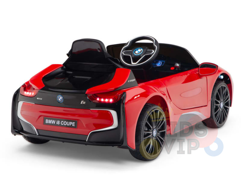 Rear view of the Red Licensed Sport BMW I8 12V Kids Ride On Power Car with a black interior, steering wheel with logo, detailed taillights, shiny rims, and parental remote control. Kids VIP logo at bottom right.