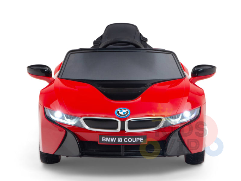 The Red Licensed Sport BMW i8 12V Kids Ride On Power Car features illuminated headlights, a clear windshield, and the iconic brand logo. It includes a parental remote control for fun and safety.