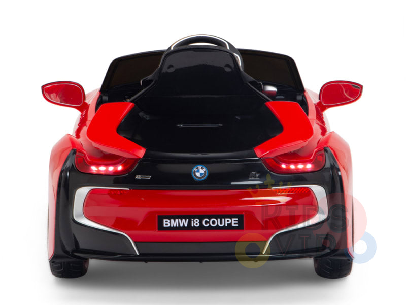 The Red Licensed Sport BMW I8 12V Kids Ride On Power Car showcases a steering wheel, rear lights, and a BMW i8 COUPE license plate. Modeled from the rear to resemble the BMW i8 Coupe, this kids electric car includes a parental remote control for enhanced safety.