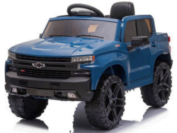 The Blue 12V Chevrolet Silverado Kids Licensed 1 Seater Ride On Truck mimics a real Chevrolet with large wheels, grille, branding, detailed headlights, steering wheel, and seats. It includes music and remote for authentic childrens playtime adventures.