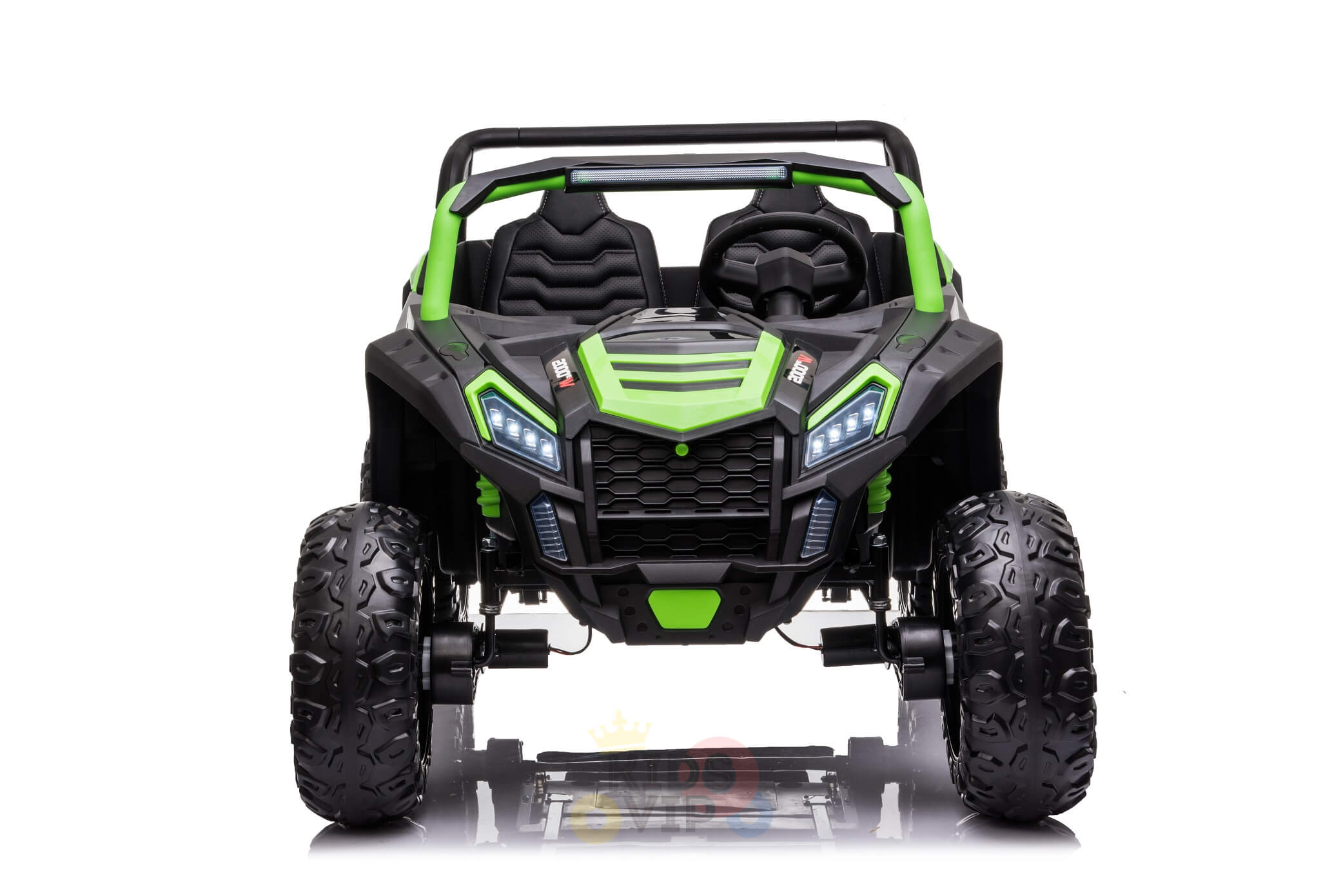 The front view of the green and black 2 Seater XXL Blade BT 4WD Edition, a Ride-On UTV with large wheels and rugged design, is shown. This 24V vehicle offers off-road excitement with two seats and visible headlights against a white background.