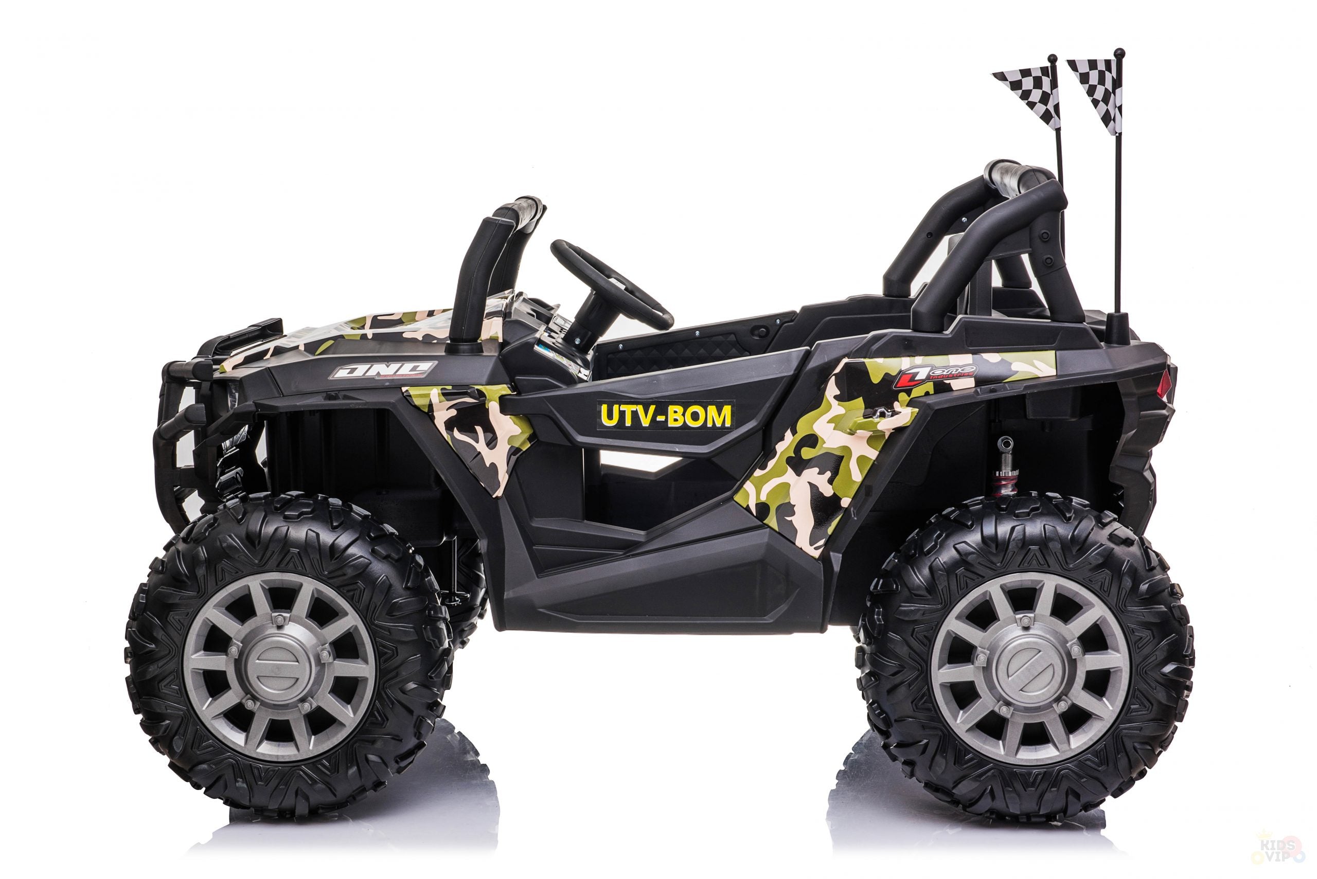 The ARMY/Green 2 Seats UTV Adventure Complete Edition is a 24V Kids Ride On UTV featuring camouflage paint, large tires, UTV-BOM on the side, and checkered flags at the back. It includes a leather seat for comfort and stands out against a pristine white background.