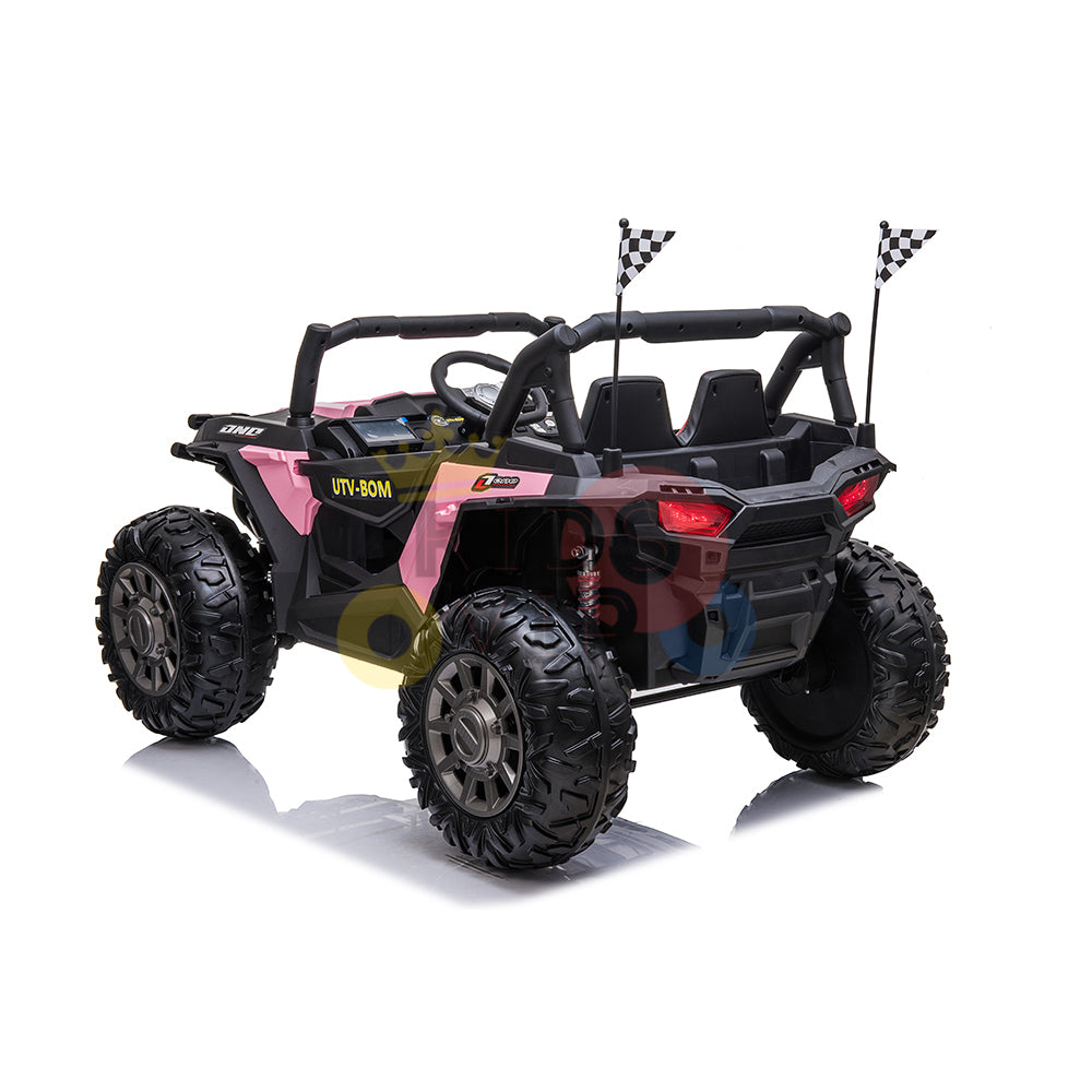 The Pink 2 Seats UTV Adventure Complete Edition is a 24V Kids Ride On with oversized wheels and checkered flags. It features UTV-BOM on the side, showcasing its sturdy and realistic design, and includes a parental remote control for safety, making it perfect for kids adventures.