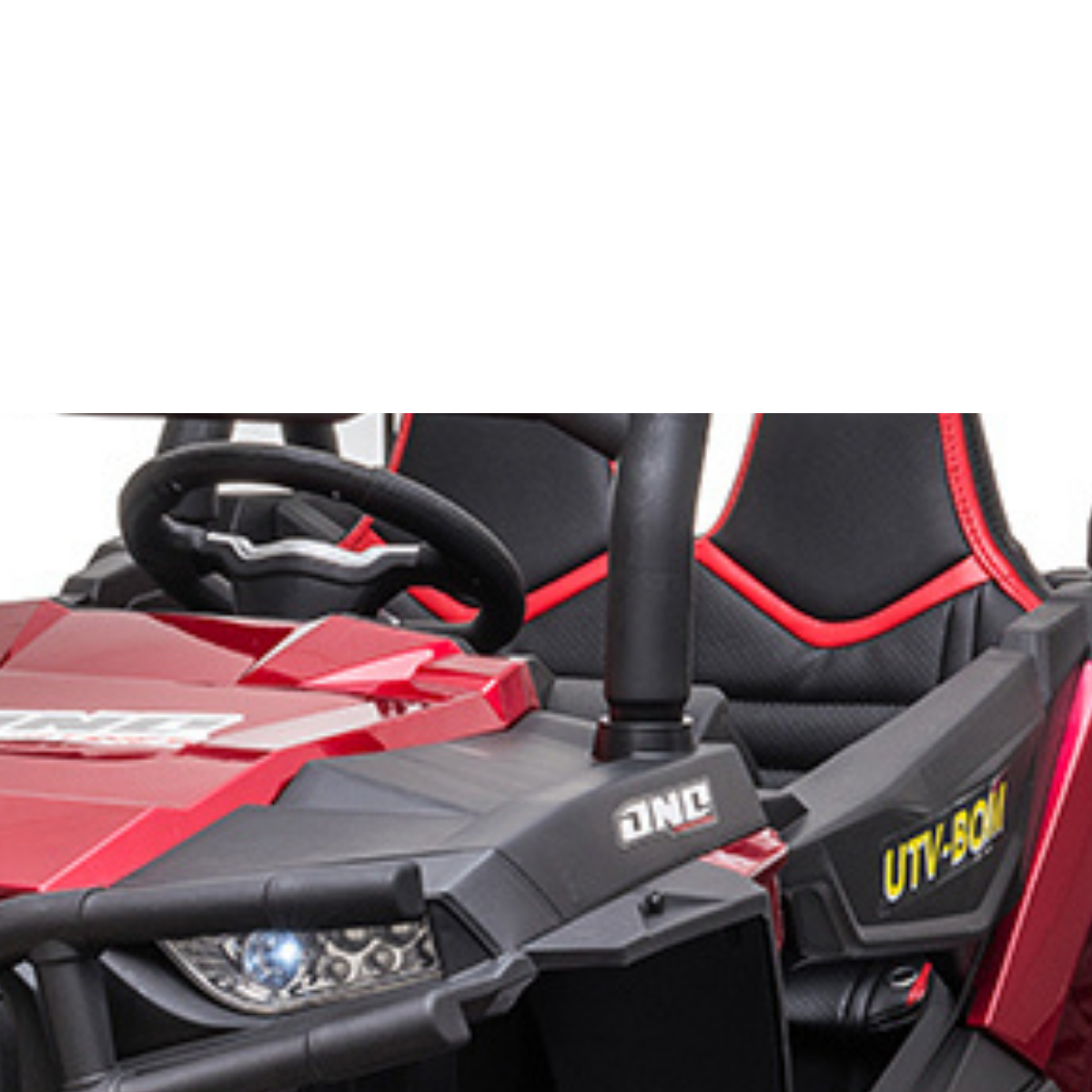 Close-up of the Red - Real Paint 2 Seats UTV Adventure Complete Edition, a childrens 24V ride-on car with a steering wheel, leather seat, LED-style headlights, and sporty design. UTV-BON is visible on the side. It includes an RC for parental control to ensure safe playtime.