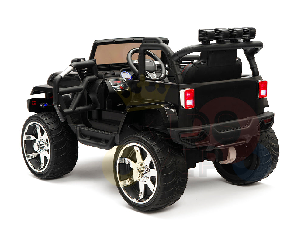The 4X4 Big Wheels EVA Edition 12V Kids Ride-on Truck features a black open-top design, upgraded elements like large silver wheels, a steering wheel, red taillights, and dual spotlights on a roll bar. Its angled to highlight the rear and left side.