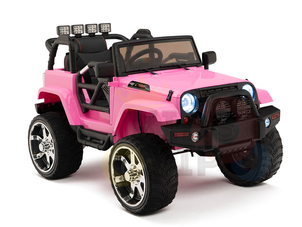 The 4X4 Big Wheels EVA Edition 12v Ride-on Truck for kids, in pink, resembles a child-sized Jeep with large wheels, four roll bar spotlights, a front grill, realistic interiors featuring seats and a steering wheel. For safety, it includes parental remote control to guide adventures.