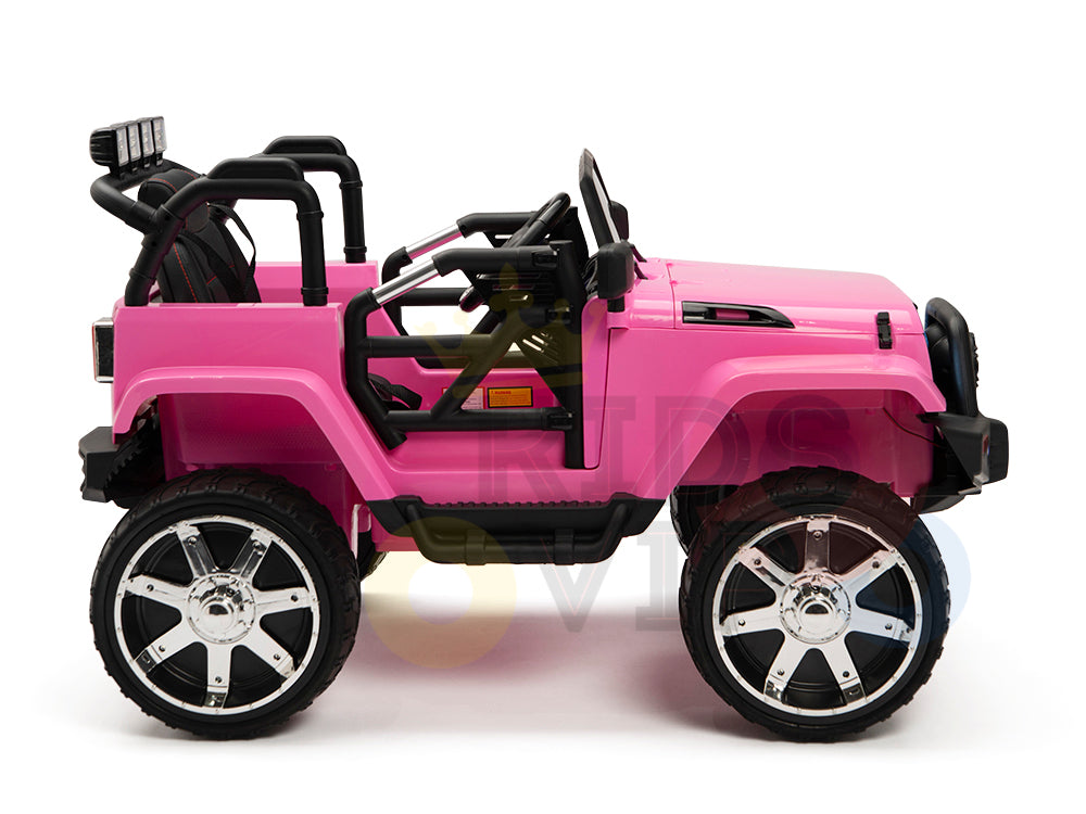 The 4X4 Big Wheels EVA Edition is a vibrant pink ride-on toy Jeep for kids, featuring rugged black detailing, large silver-and-black wheels, and a 12v battery. It includes roll bars, side mirrors, and ensures safety with an RC parental control option.