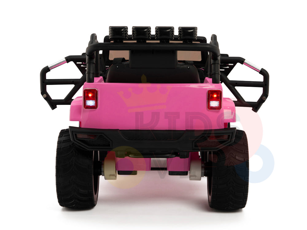 The 4X4 Big Wheels EVA Edition 12v Kids and Toddlers Ride on Truck with RC is pink, featuring oversized wheels, rear lights, a black roll bar, rearview mirrors, and a spare wheel. It includes the KIDS VIP logo and comes with a parental remote control for safety.