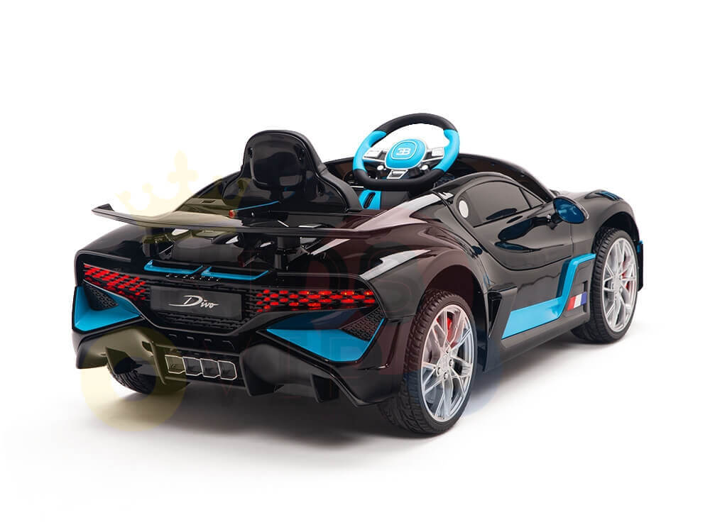 The Enhance Your Bugatti Divo with a 12v Receiver toy car in black and blue boasts intricate detailing, a sleek design, stylized dashboard, reflective wheels, and an enhanced control range for a modern, dynamic look.