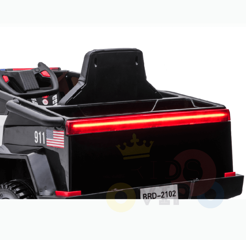 A black Futuristic 12V Fire Truck Ride On for kids and toddlers features a visible rear view, red LED light strip, U.S. flag sticker, and 911 on the back. It includes a BRD-2102 license plate, inviting boundless adventures to steer their imaginations with sirens and music playing along.
