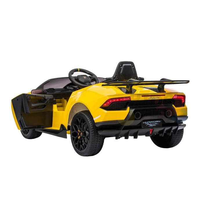 A Yellow Officially Licensed 12V Lamborghini Huracan Sports Edition Ride on Car is shown from the back with black wheels, an open driver-side door, a small steering wheel, leather seat, and added charm with a spoiler and detailed taillights on a white background.