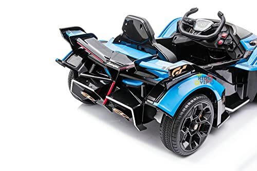 The Blue Official 12V Lamborghini Vision GT Kids Ride-On Car features a sleek blue and black design with detailed rear lights, exhaust pipes, visible steering wheel, dashboard, stylized wheels, and an eco-leather seat for ultimate comfort.