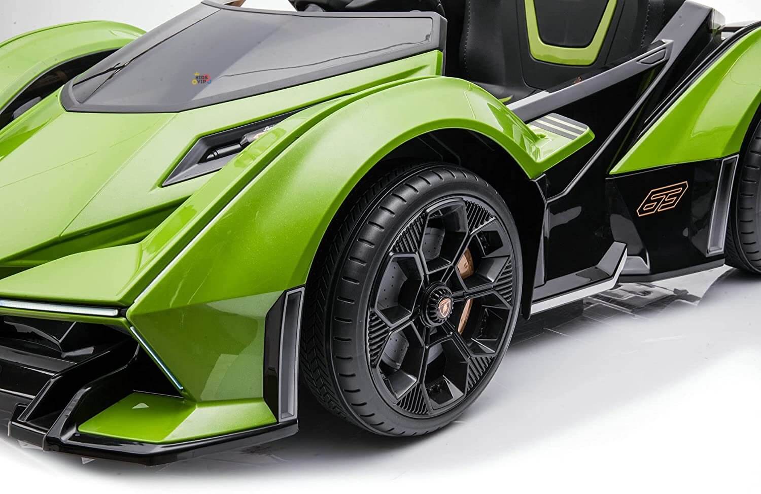 A close-up of the sleek Green 12V Official Lamborghini Vision GT Kids Ride on car, featuring futuristic green and black design with sharp angles, intricate wheels, a low profile, and stylish modern automotive elements powered by an innovative 12V battery system.