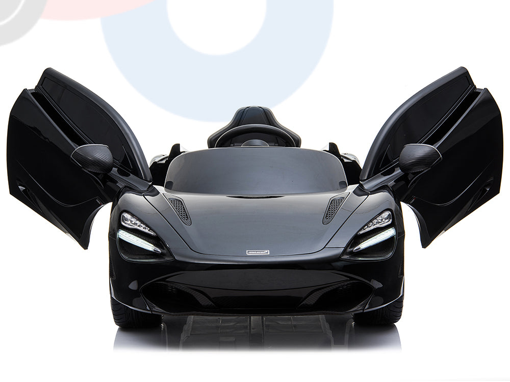 The Black 12V McLaren 720S Kids Licensed Ride On Car, a one-seater with rubber wheels and remote, features an aerodynamic design and distinctive glowing headlights. Its upward-opening doors resemble wings, highlighted against a white background for a striking appearance.
