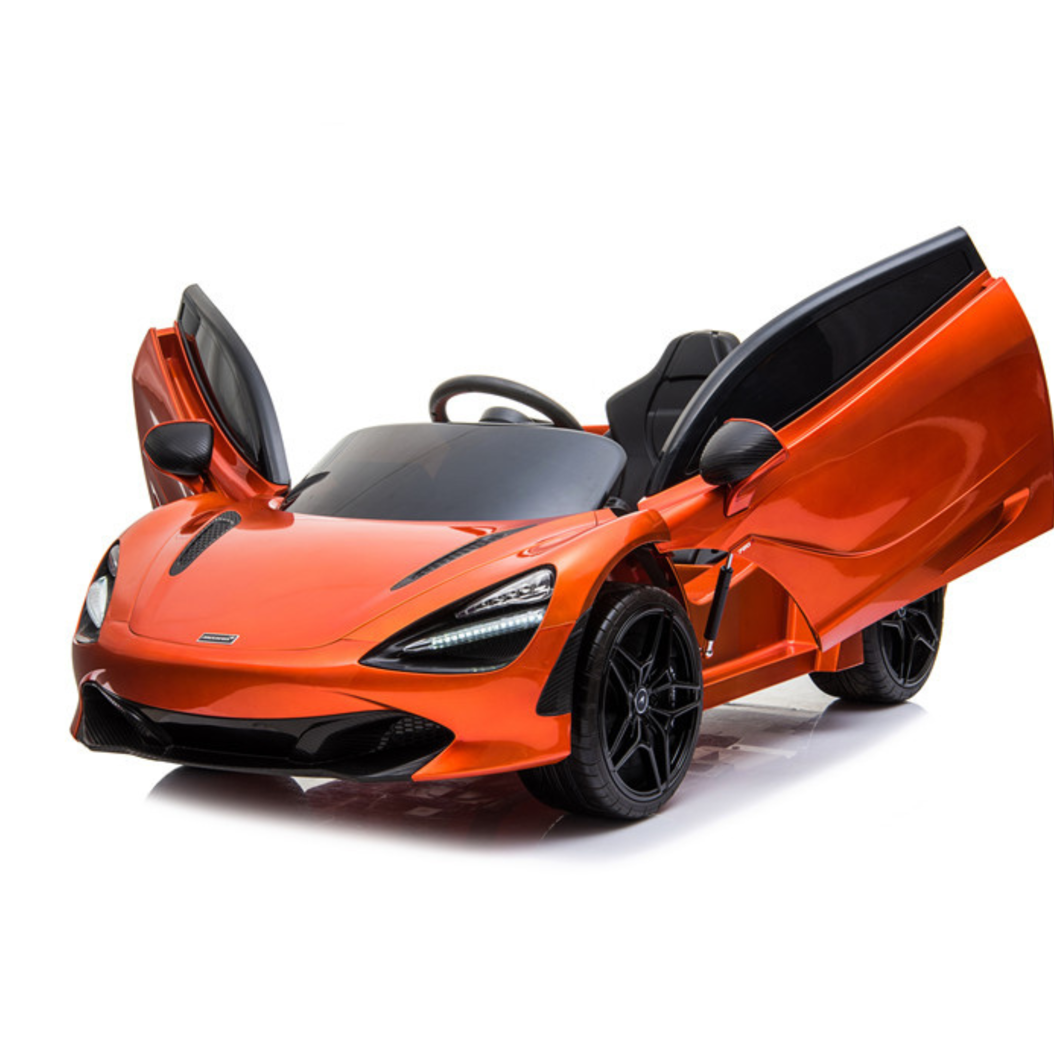 A sleek, orange ride-on super car with black accents and open butterfly doors, resembling the McLaren 720S. This Orange 12V McLaren 720S Kids Licensed 1 Seater Ride On Car features black rubber wheels, a steering wheel, remote control capabilities, and realistic detailing.