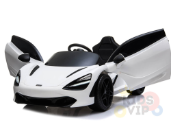 The White 12V McLaren 720S Kids Licensed 1 Seater Ride On Car features sleek lines, open doors, a black interior and wheels, and the Kids VIP logo partially visible.