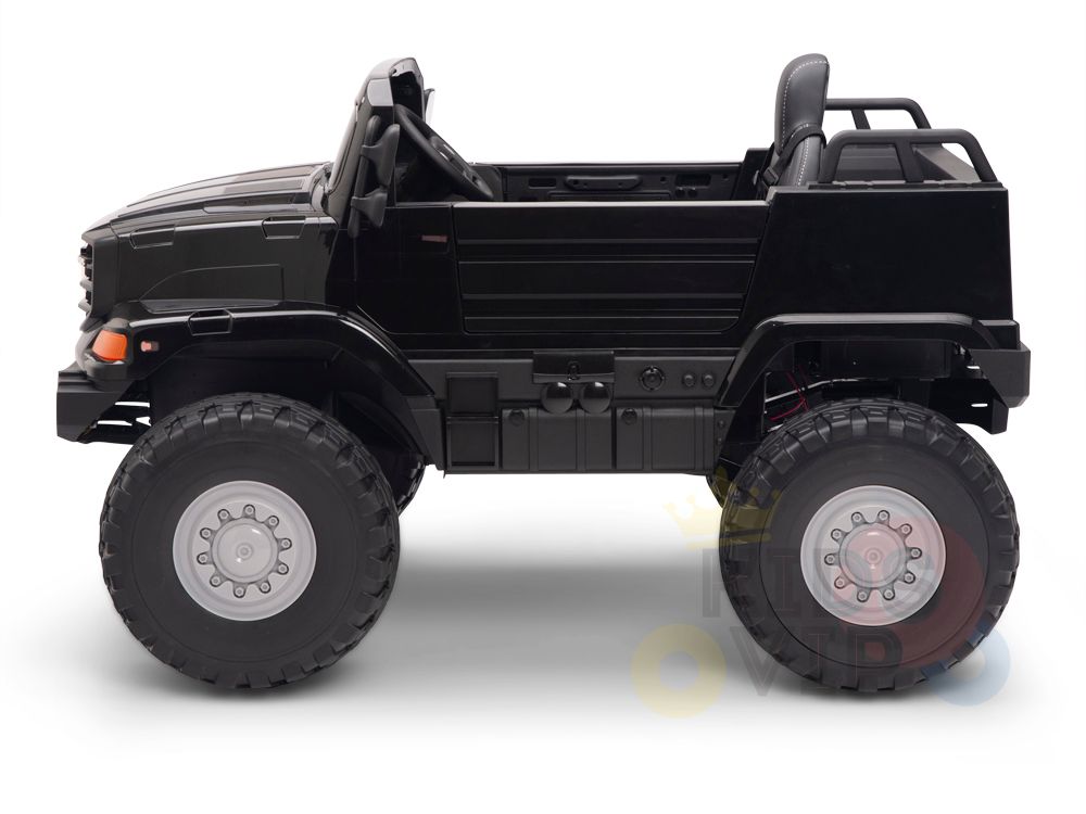A Black 12V Mercedes Benz Zetros Kids 1 Seater Ride On Truck is shown in profile on a white background, featuring rubber wheels and an open cab, offering an adventurous ride with remote control.
