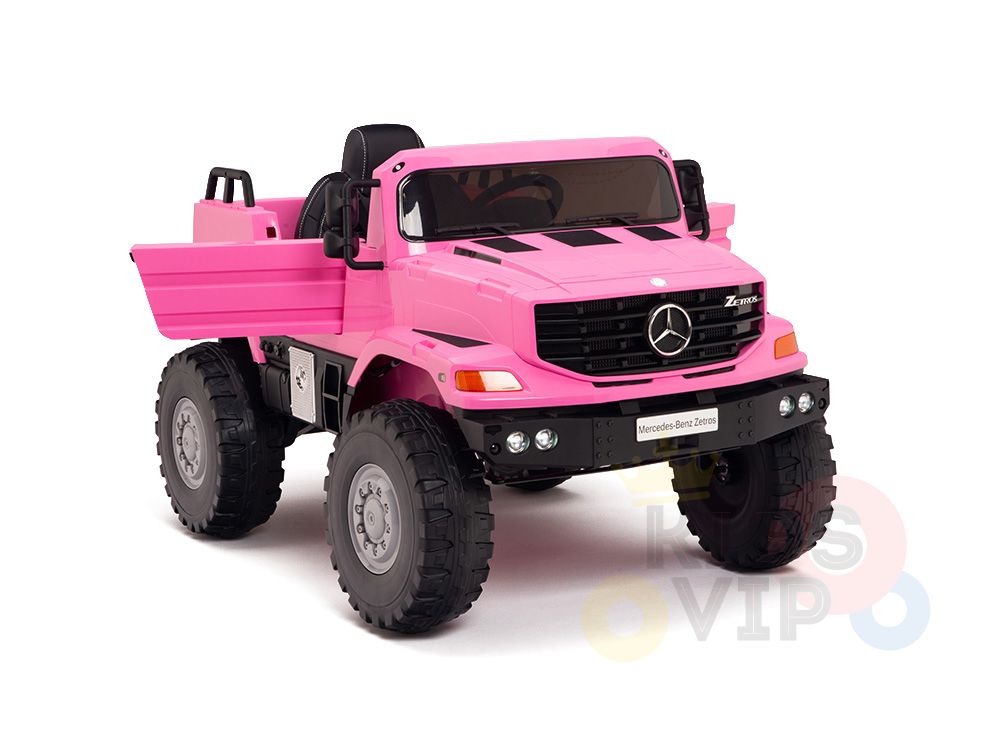 The Pink 12V Mercedes Benz Zetros Kids 1 Seater Ride On Truck, inspired by the iconic design, features rubber wheels, a signature grille, and a detailed interior with one seat. Perfect for kids.
