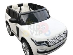 The 24V Complete White on White Edition Range Rover ride-on car for kids features two seats, detailed black trim, and the KIDS VIP logo partially visible on the windshield. This mini Range Rover mirrors its real-life version but is designed for children.